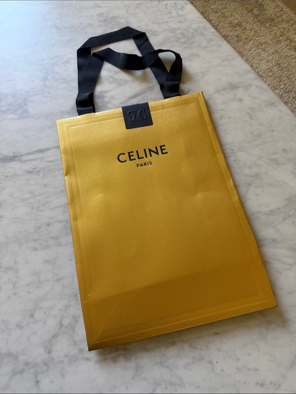 Celine Gold paper gift Bag with Black Ribbon Handles